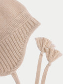 Ultimate Warmth Knit Tie Hat Beige detail view on white background

