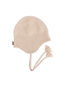Ultimate Warmth Knit Tie Hat in beige made from soft cashmere, featuring extended ear flaps for warmth and comfort.