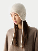 Ultimate Warmth Knit Tie Hat White side view on white background
