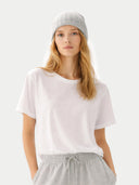 Unisex Beanie High Rise  worn by model, detail view on white background
