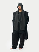 Cashmere Hooded Wrap Black worn by model, front view, on white background