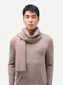 Organic Colour Cashmere Woven Scarf Taupe worn by model, detail view on white background