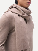 Organic Colour Cashmere Woven Scarf Taupe worn by model, detail view on white background