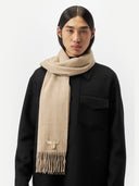 Unisex Cashmere Fringed Scarf Warm Grey worn by model, detail view on white background