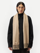 Unisex Cashmere Fringed Scarf Warm Grey worn by model, detail view on white background