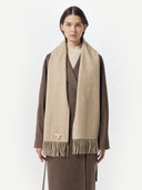Unisex Cashmere Fringed Scarf Warm Grey worn by model, detail view on white background