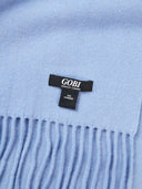 Close-up of a blue scarf with a Gobi label on it.