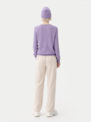 € 99 Cashmere Hat & Sweater Set Purple worn by model, back view on white background
