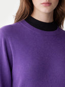 Women's Grape Jam Cashmere Crewneck Sweater worn by model, detail view on white background