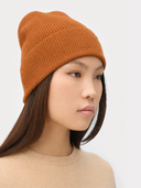 Bone Brown Cashmere Rib Knit Beanie  worn by model, side view on white background