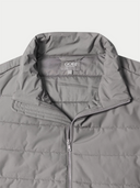 Gray puffer jacket with 'Gobi' brand logo on a light gray background