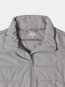 Gray puffer jacket with GOBI branding on a light gray background
