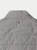 Gray jacket with a brand logo on a light gray background