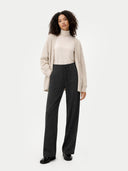 A pair of dark charcoal gray knit wide-leg pants with a drawstring waist, shown flat against a light gray background. #color_charcoal