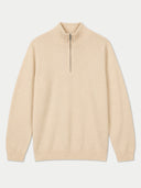 A light beige quarter-zip pullover sweater with a mock neck collar and ribbed cuffs and hem, shown flat on a light gray background.