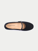 Pair of black flat shoes with a strap on a light gray background #color_black