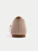 Pair of beige shoes with brown straps on a light gray background #color_nougat-brown