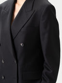Women's  Black Double-Breasted Cashmere Suit Blazer  worn by model, detail view on white background
