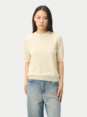 Women's Cashmere Elbow-Sleeve Sweater in off-white, worn by a model