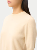 Women's Cashmere Elbow-Sleeve Sweater in off-white, worn by a model