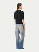 Women's Cashmere Elbow-Length Sleeve Cashmere Sweater Black worn by model, back view on white background