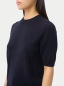 Women's Short-Sleeve Cashmere Sweater Navy worn by model, detail view on white background