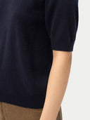 Women's Short-Sleeve Cashmere Sweater Navy worn by model, detail view on white background