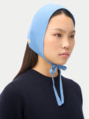 Azure Blue Cashmere Bonnet For Woman worn by model side view on white background