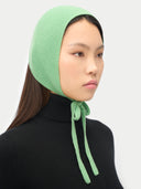 Pink Cashmere Bonnet For Woman worn by model side view on white background