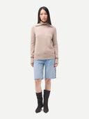 Women's  Warm Grey Fold-Over Turtleneck Cashmere Sweater worn by model, front view on white background