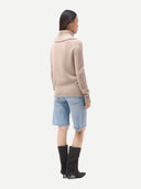 Women's  Warm Grey Fold-Over Turtleneck Cashmere Sweater worn by model, back view on white background