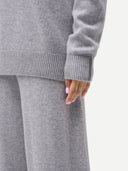 Women's Cashmere Pullover Hoodie High Rise worn by model, detail view on white background
