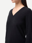 Timeless Cashmere V-Neck Sweater Black  worn by model, detail view, on white background