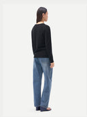 Timeless Cashmere V-Neck Sweater Black  worn by model, back view, on white background