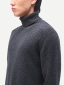 Men's Charcaol Turtleneck Cashmere Sweater worn by model, detail view on white background