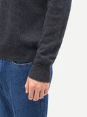 Men's Charcaol Turtleneck Cashmere Sweater worn by model, detail view on white background