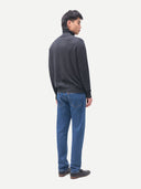 Men's Charcaol Turtleneck Cashmere Sweater worn by model, back view on white background