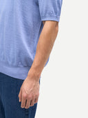 Men Classic Polo Shirt with Short Sleeve Cambray Blue worn by model, detail view on white background