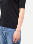 Women's Cashmere Silk Shirt with High Neck Black worn by model, detail view on white background