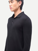 Men Classic Polo Shirt with Long Sleeve Black worn by model, side view on white background