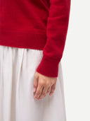 Timeless Cashmere V-Neck Sweater Chili Pepper worn by model, detail view, on white background