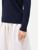 Timeless Cashmere V-Neck Sweater Navy Blazer worn by model, detail view, on white background