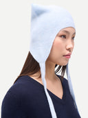 Earflaps hat Illusion Blue  worn by model side view on white background