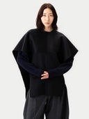 Versatile Cashmere Poncho Black worn by model, detail view, on white background