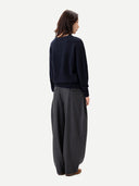 Barrel-Leg Cashmere Pants Charcoal  worn by model, back view on white background