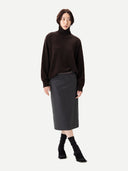 Unisex High-Neck Cashmere Sweater Mole worn by model, front view, on white background