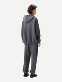 Men wearing a gray hoodie on a white background