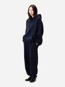 Unisex Inida Ink Cashmere Sweatshirt worn by model, front view on white background