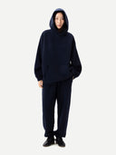 Unisex Inida Ink Cashmere Sweatshirt worn by model, front view on white background