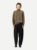 Unisex High-Neck Cashmere Sweater Aloe worn by model, front view, on white background
